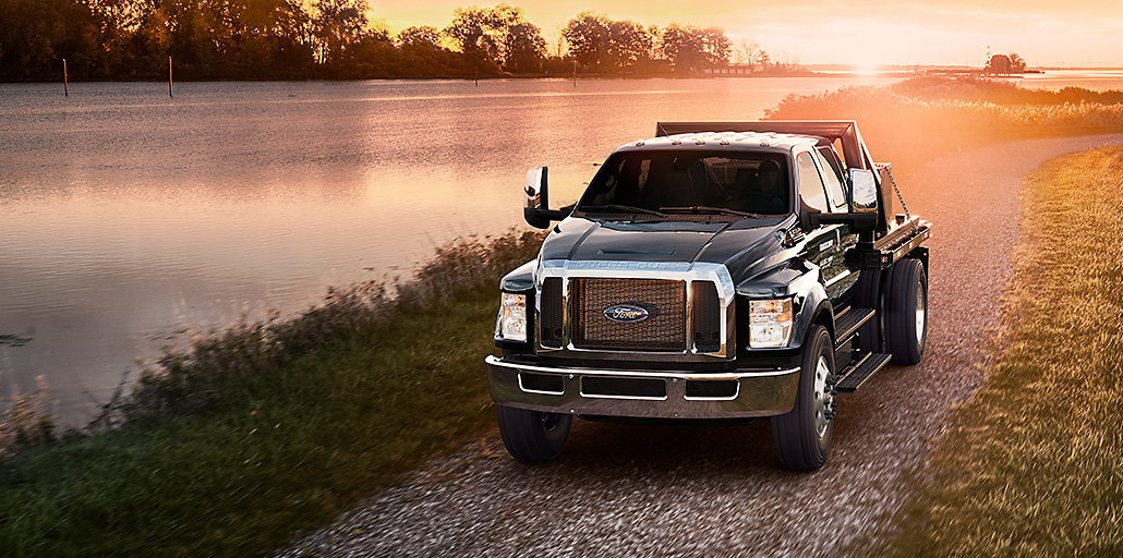 2021 Ford Medium Duty Flatbed hauling cement bricks.