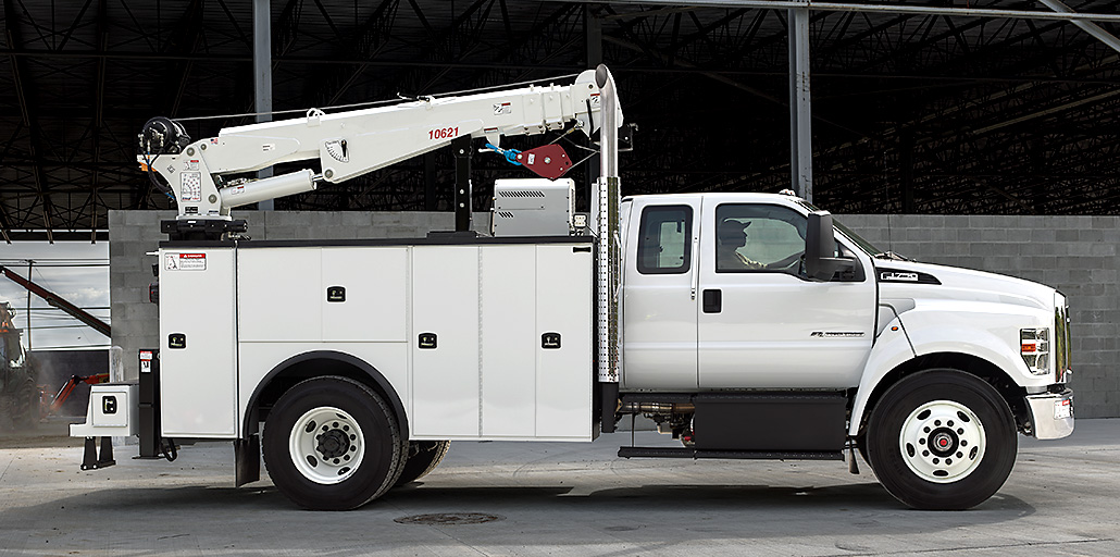 A white Medium Duty Ford truck.