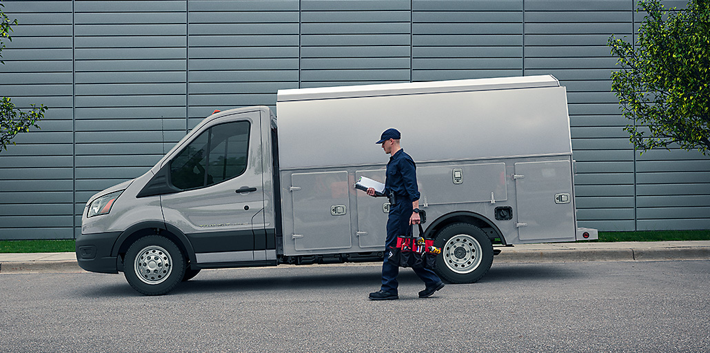 Ford Transit Chassis Service body at a job site.