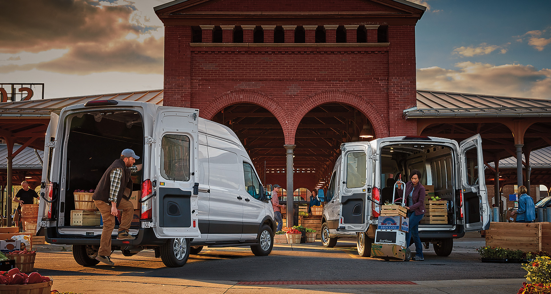 Painters from Kallery's Custom Painting get supplies from a 2020 Ford Transit.